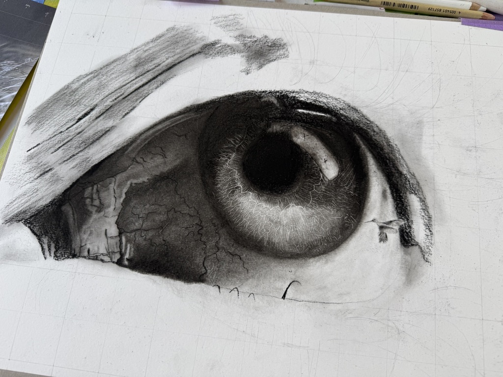 De tekening verder uitgewerkt, met donkere schaduwen en de eerste kolibrie